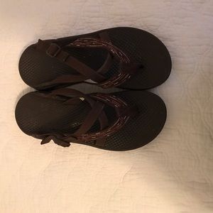 Brown and pink Chacos